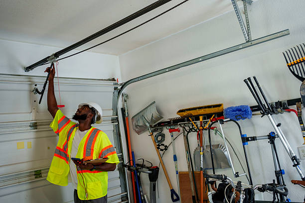 Professional Garage Door Panel Replacement technician working in Lewistown, IL